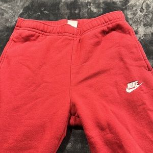 Women’s red Nike joggers
